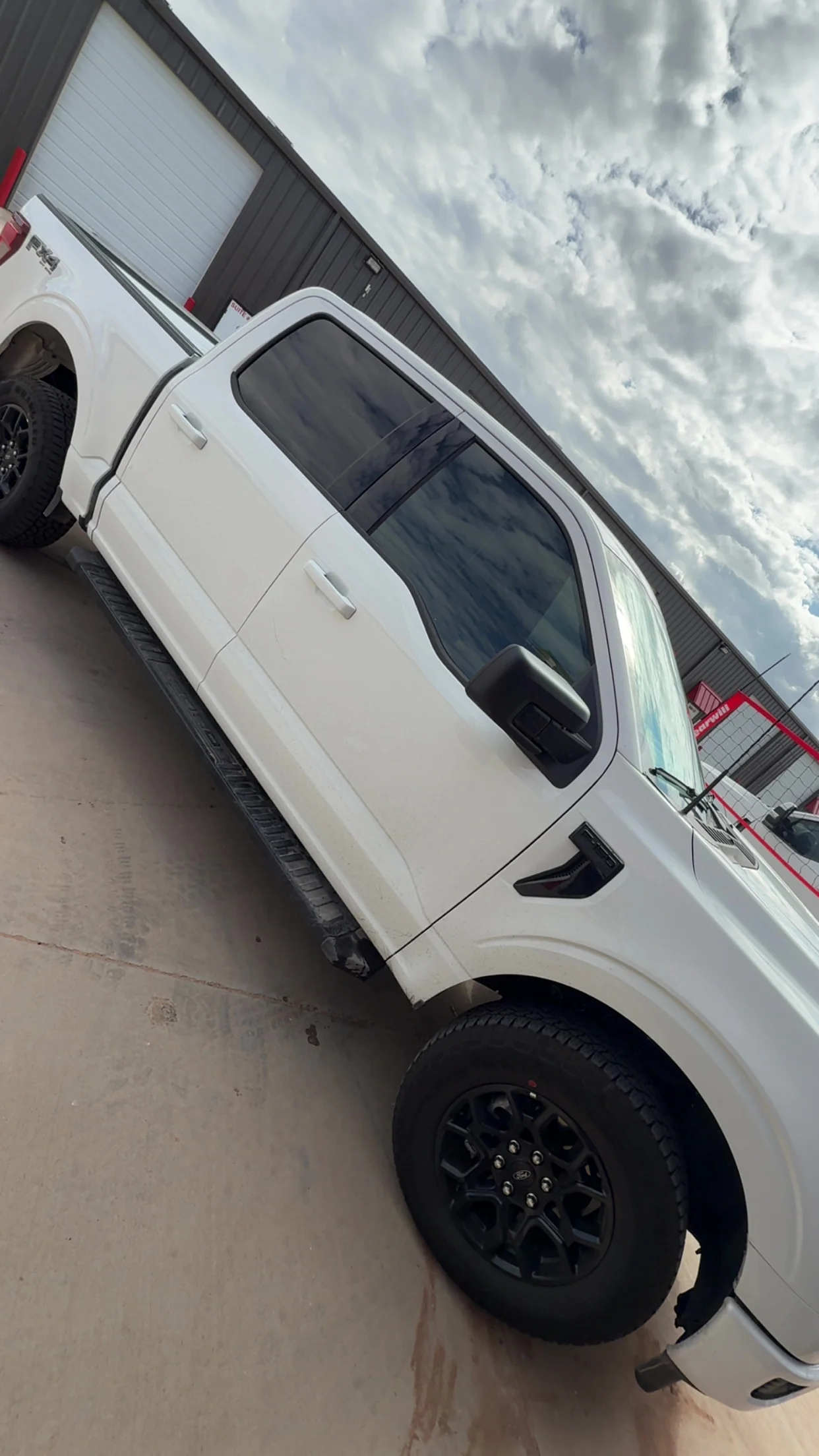 Inside Rockstar Wraps and Tint — wrap shop and install bay